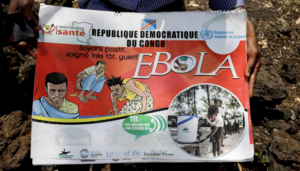 Ebola awareness poster from the Democratic Republic of Congo with cartoons and logos (UNICEF, WHO) in the design and a circular photo of children at a water station at the bottom right.